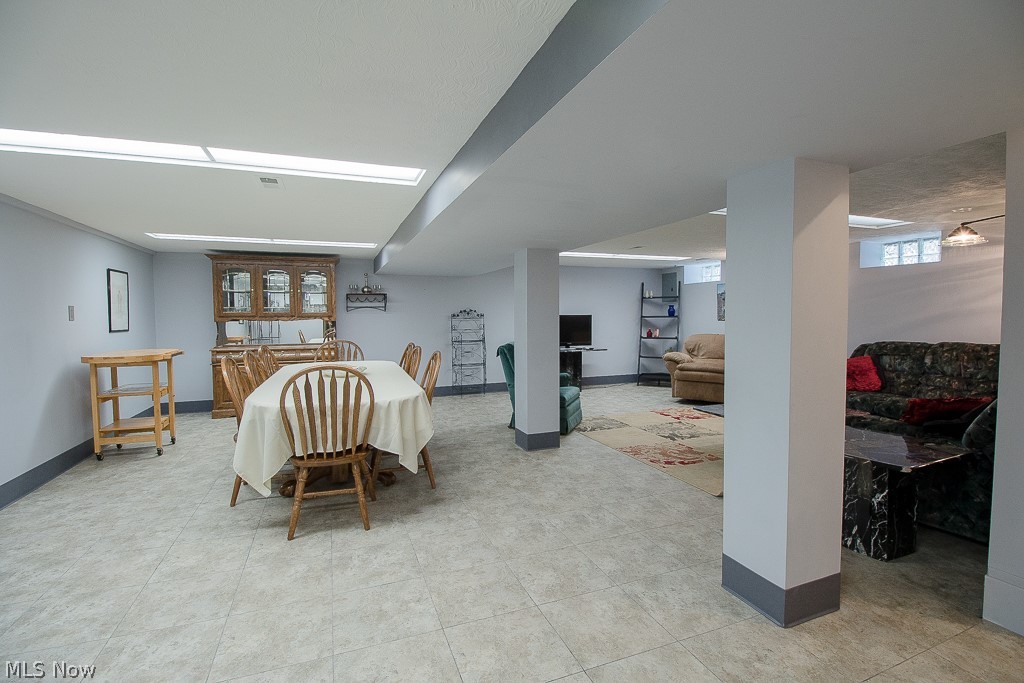30425 Vineyard Road Willowick, OH 44095 - Photo 14 of 22 Thought you saw it all? The Finished Basement Recreation Room has another side to it! You will be amazed with the amount of room the basement offers!
