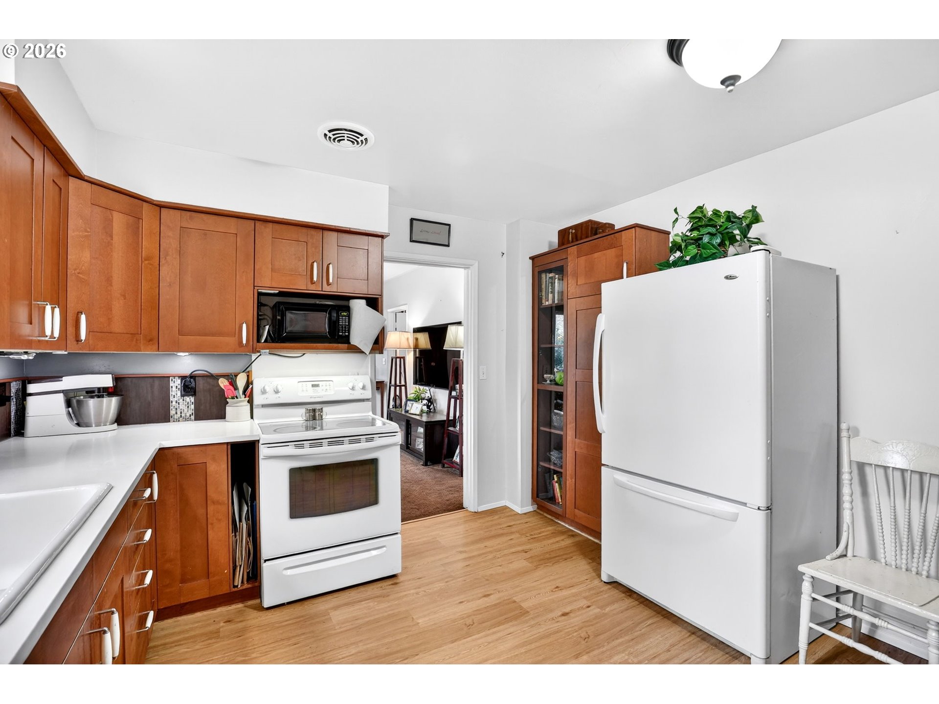 2820 Northeast Oregon Street Portland, OR 97232 - Photo 13 of 41 a kitchen with stainless steel appliances a refrigerator sink and cabinets