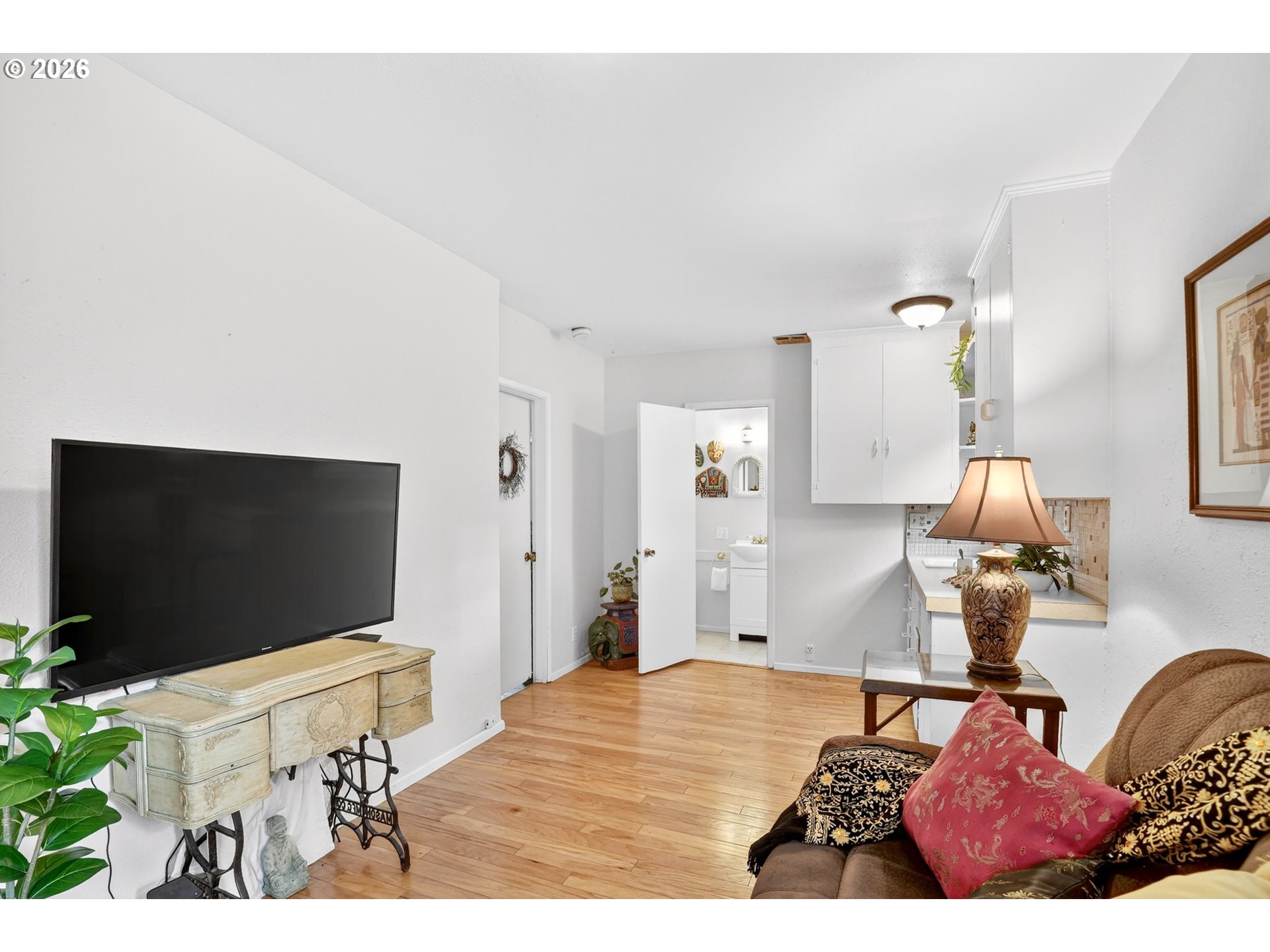 2820 Northeast Oregon Street Portland, OR 97232 - Photo 16 of 41 a living room with furniture and a flat screen tv