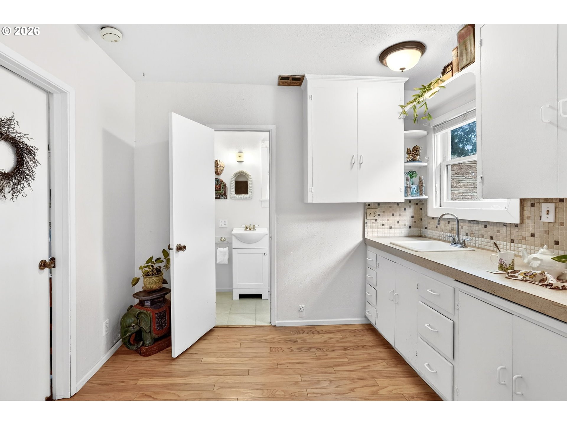 2820 Northeast Oregon Street Portland, OR 97232 - Photo 18 of 41 a kitchen with a sink and cabinets