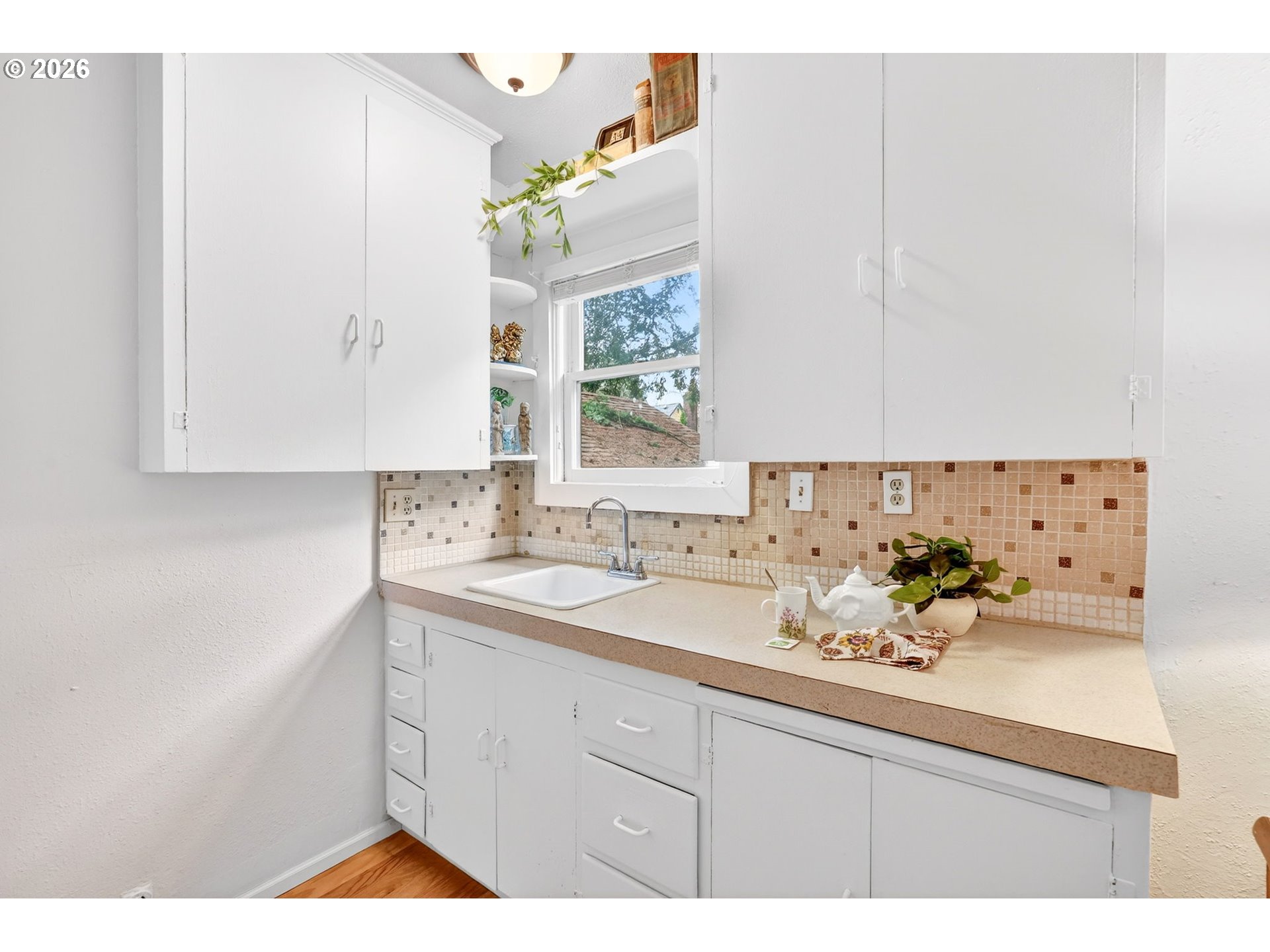 2820 Northeast Oregon Street Portland, OR 97232 - Photo 19 of 41 a bathroom with a sink and a mirror
