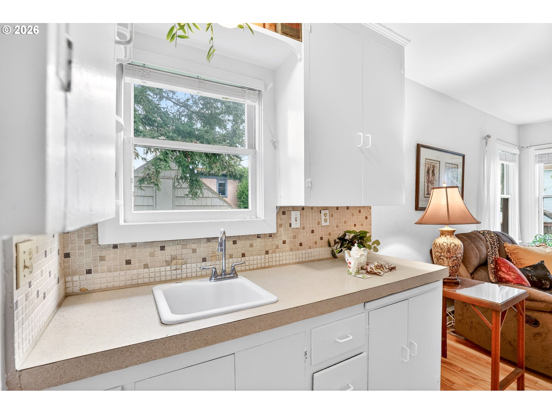 2820 Northeast Oregon Street Portland, OR 97232 - Photo 20 of 41 a bathroom with a sink mirror and a window