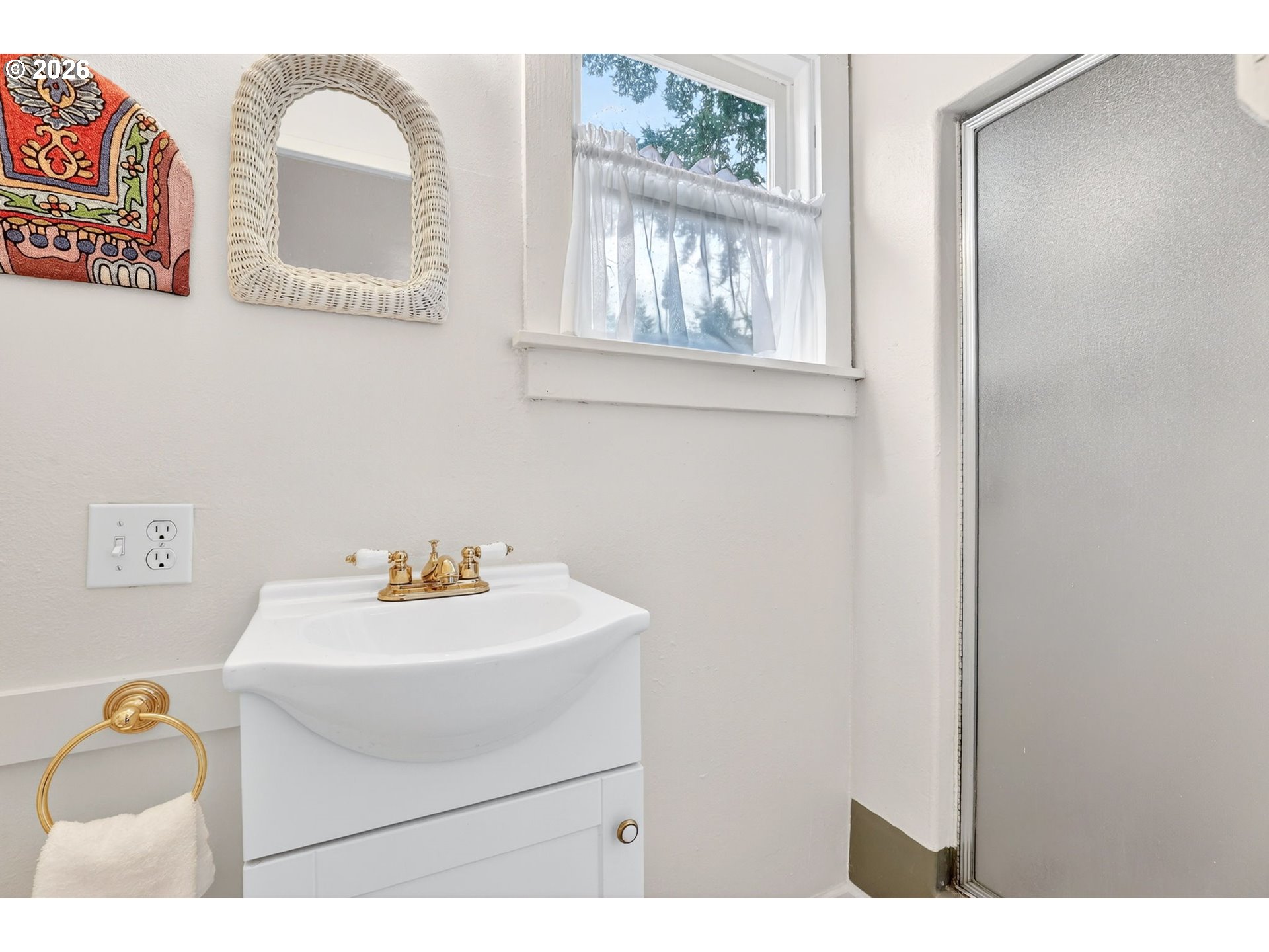 2820 Northeast Oregon Street Portland, OR 97232 - Photo 21 of 41 a bathroom with a sink and a mirror