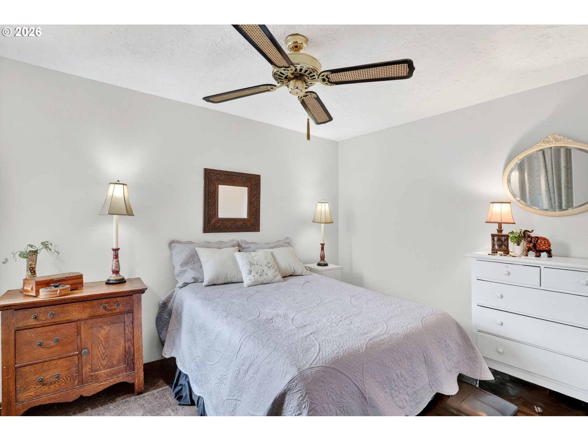 2820 Northeast Oregon Street Portland, OR 97232 - Photo 7 of 41 a bedroom with a bed and a dresser
