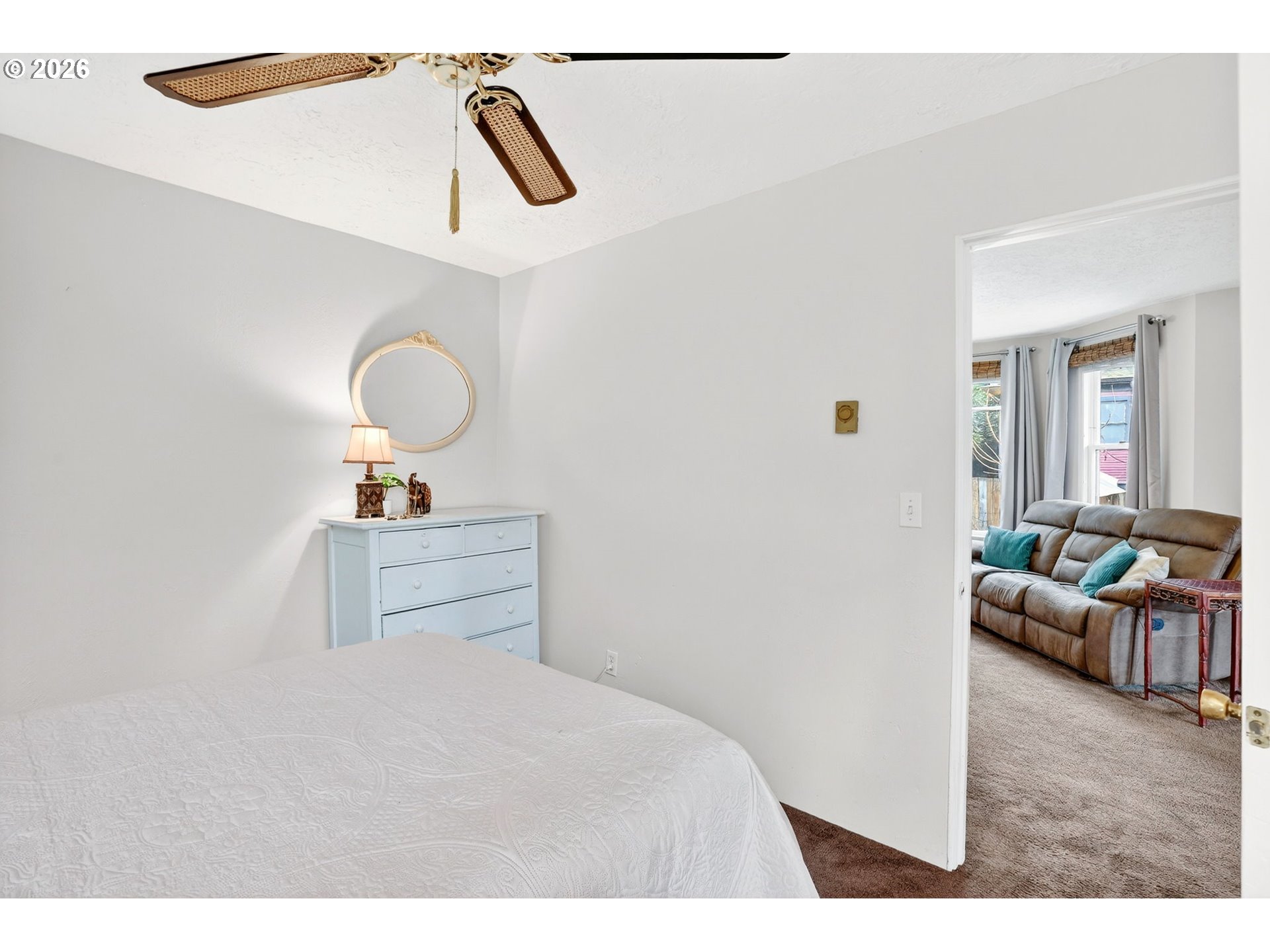 2820 Northeast Oregon Street Portland, OR 97232 - Photo 8 of 41 a bedroom with a bed and wooden floor