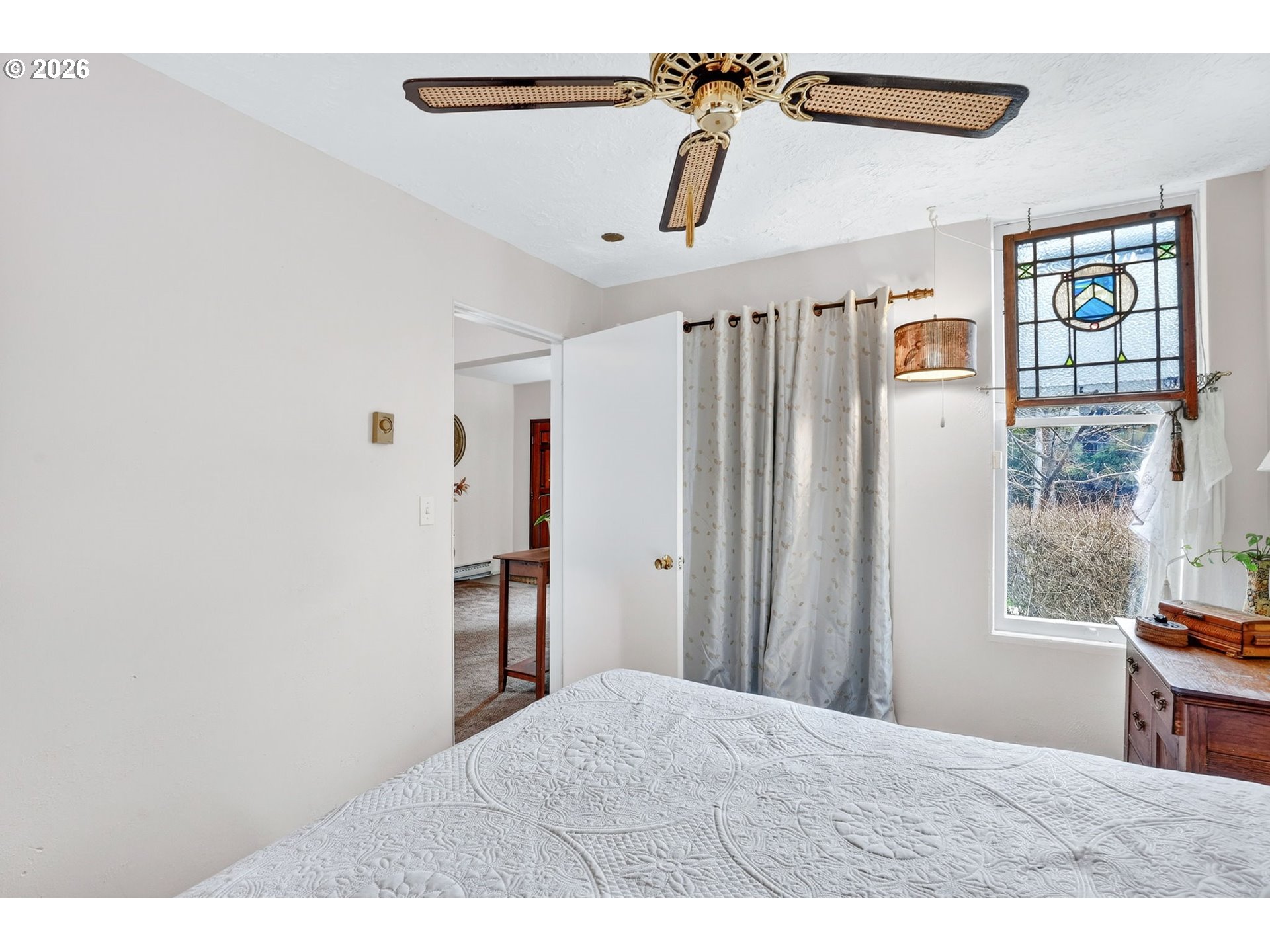 2820 Northeast Oregon Street Portland, OR 97232 - Photo 9 of 41 a bedroom with a bed and a window