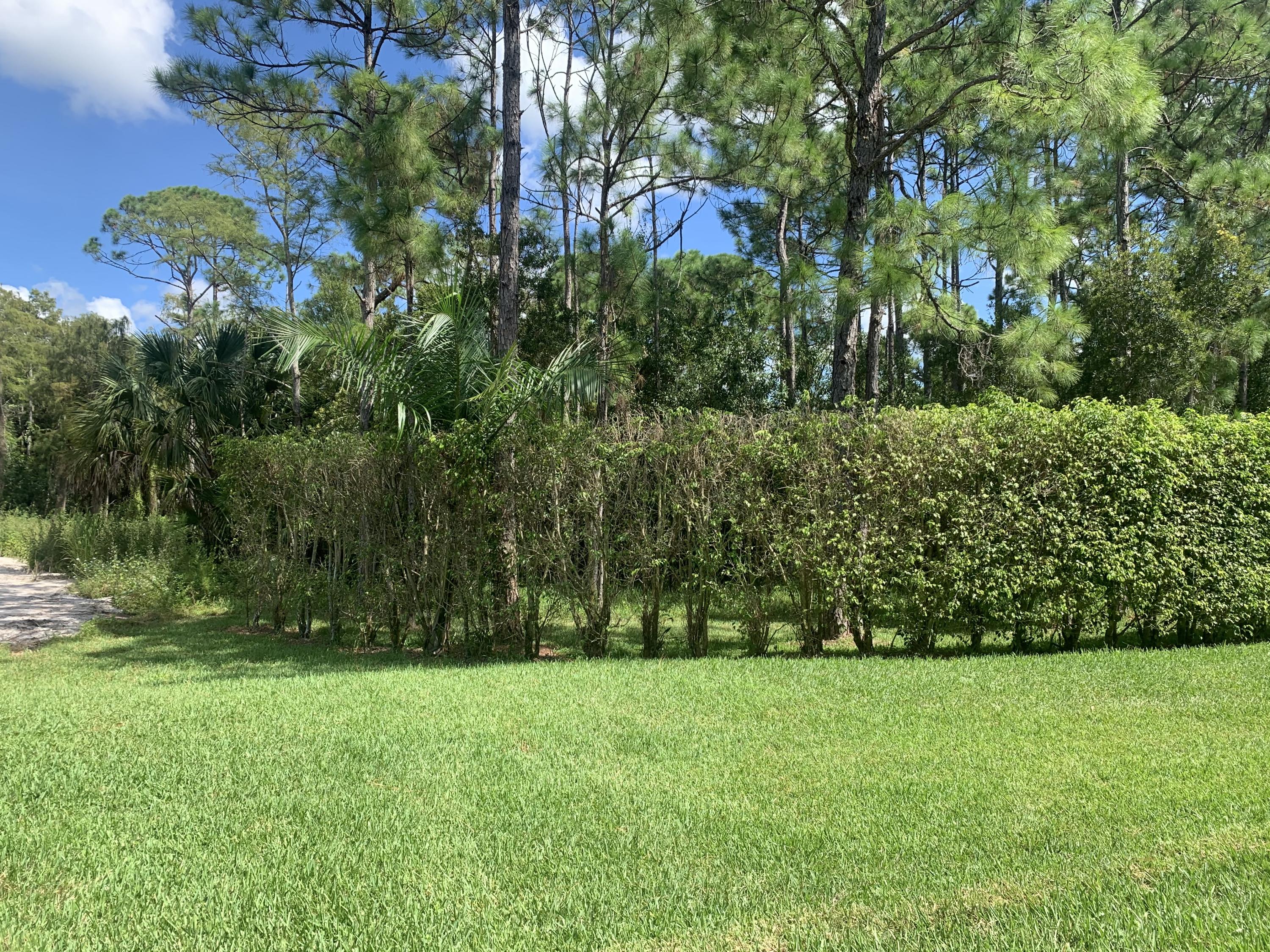 3601 Southeast Tailwinds Road Jupiter, FL 33478 - Photo 4 of 12 Side