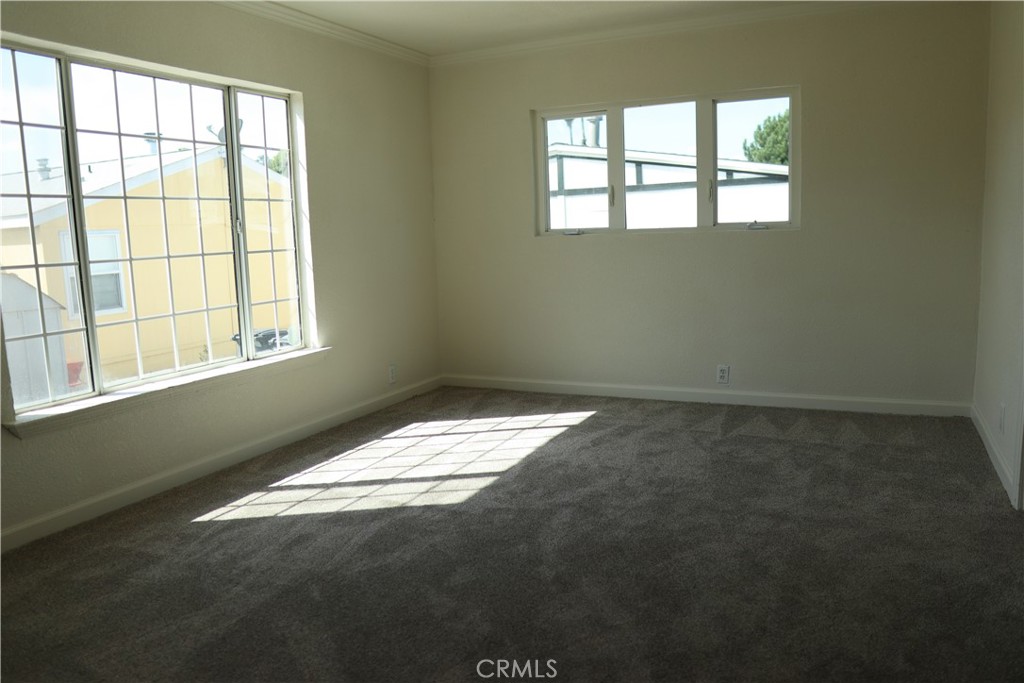 1855 East Riverside Drive, Unit 48 Ontario, CA 91761 - Photo 11 of 20 a view of empty room with window