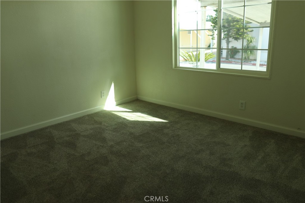 1855 East Riverside Drive, Unit 48 Ontario, CA 91761 - Photo 14 of 20 a view of room with window