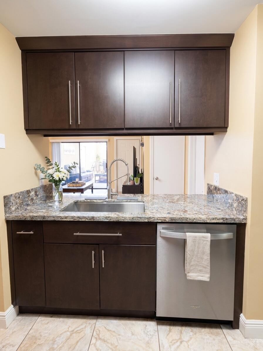 2690 North Nob Hill Road Sunrise, FL 33322 - Photo 7 of 19 Kitchen