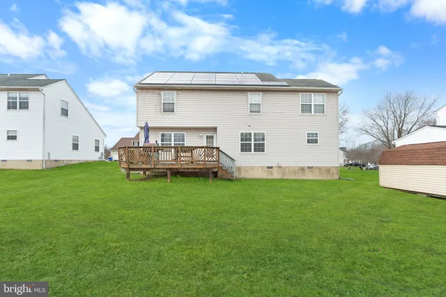 a view of a terrace with chairs