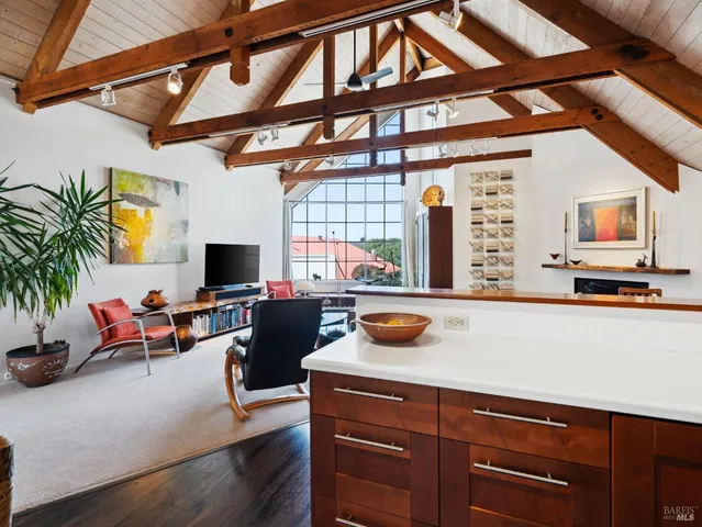a kitchen with stainless steel appliances granite countertop a stove and a sink