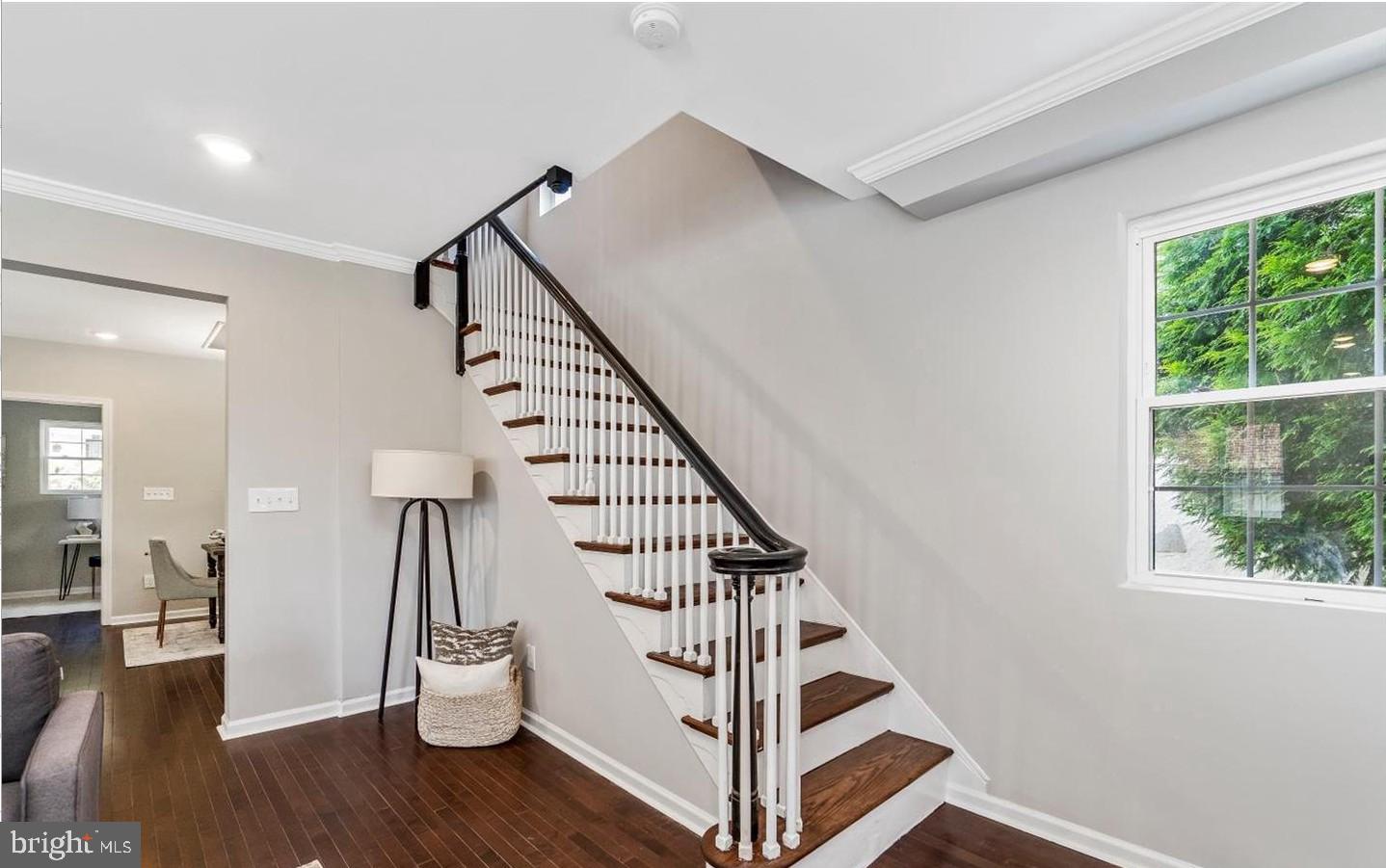 3400 Dennlyn Road Baltimore, MD 21215 - Photo 21 of 32 Inviting entryway with elegant staircase.