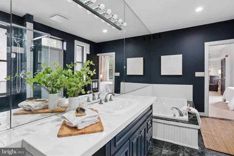 a kitchen with sink refrigerator and stove