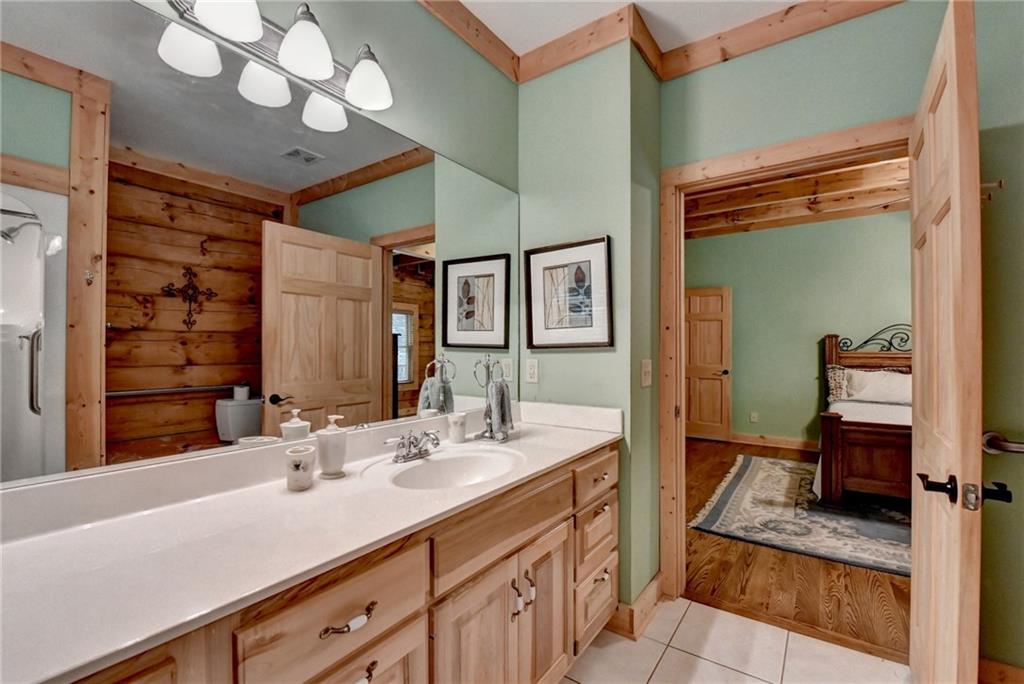 82 Walnut Grove Lane Tiger, GA 30576 - Photo 34 of 88 a bathroom with a double vanity sink mirror and toilet