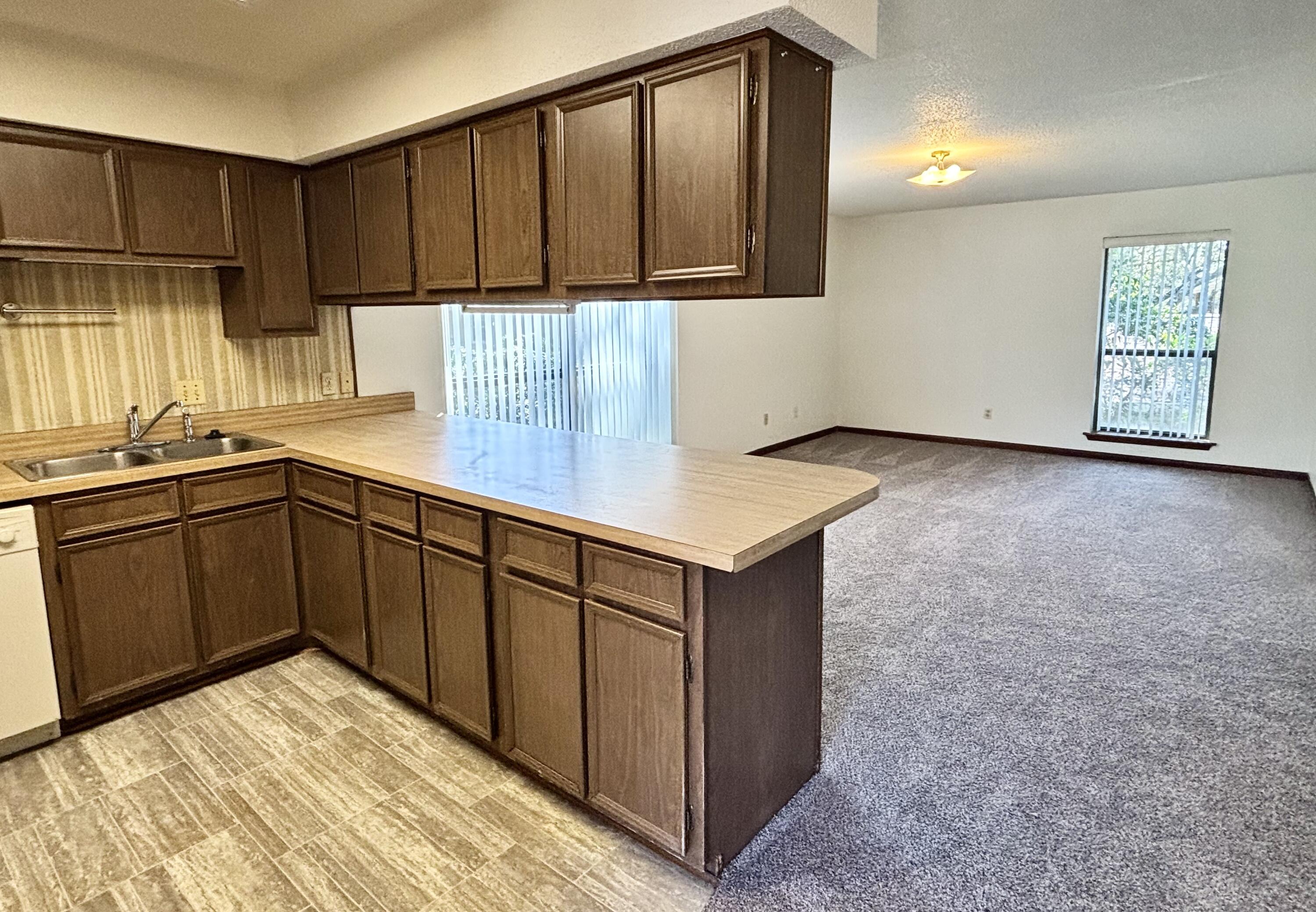 337 Lewis Street, Unit F Fort Walton Beach, FL 32547 - Photo 6 of 10 a kitchen with a sink and cabinets