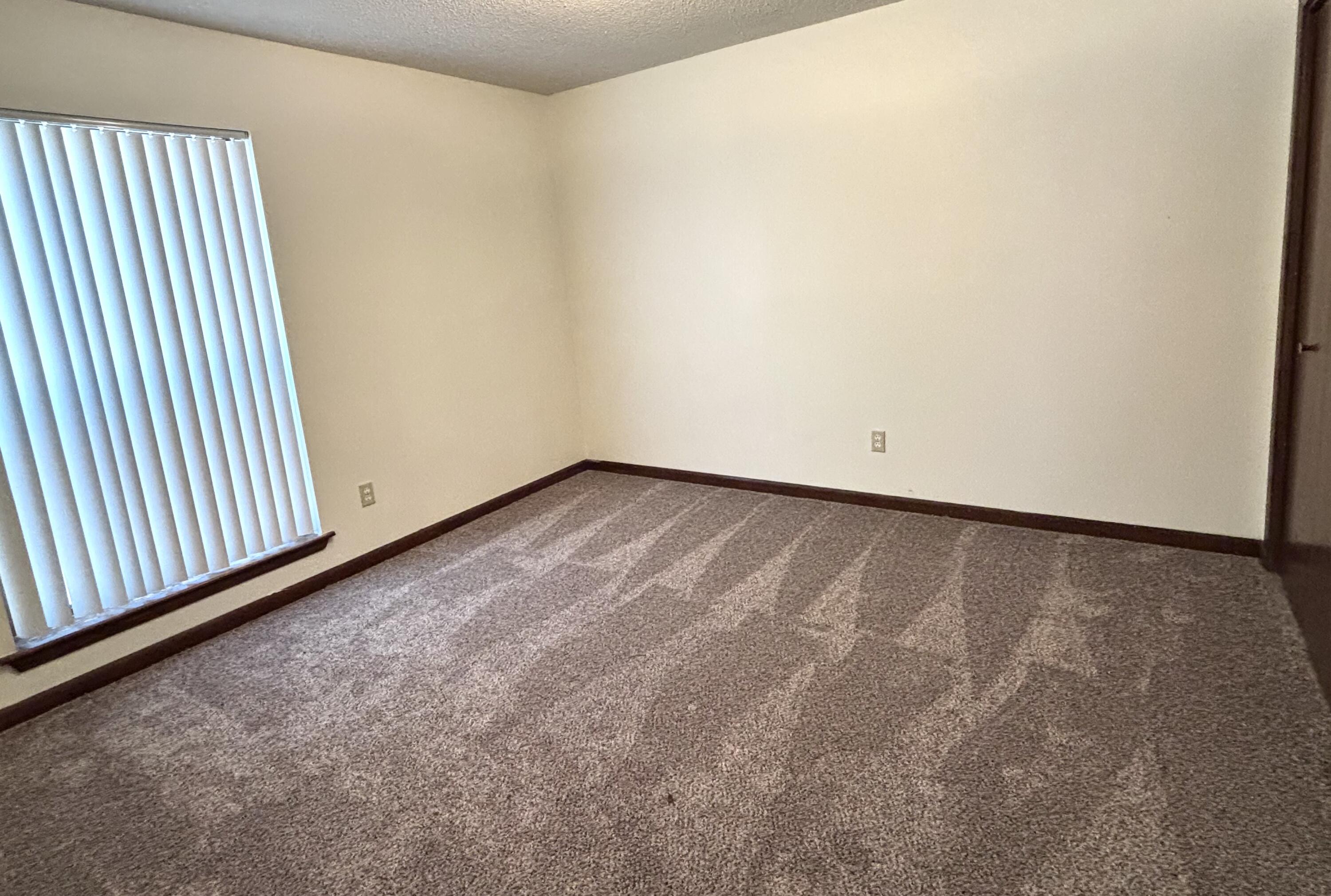 337 Lewis Street, Unit F Fort Walton Beach, FL 32547 - Photo 8 of 10 a view of a room with wooden floor