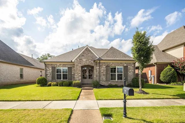 a view of a house with a swimming pool