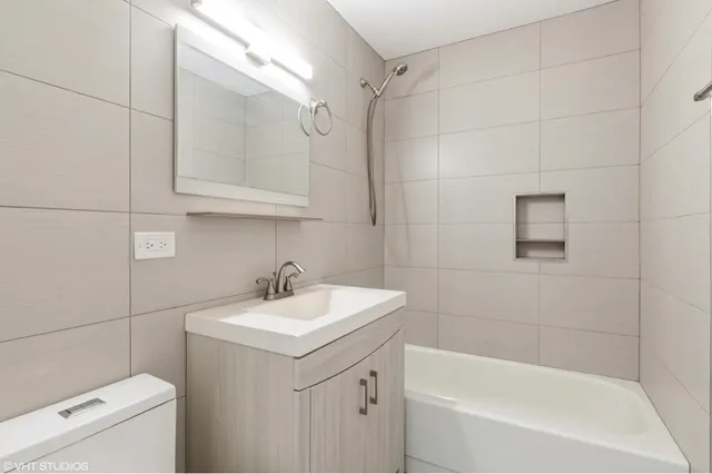 a view of a kitchen with a sink