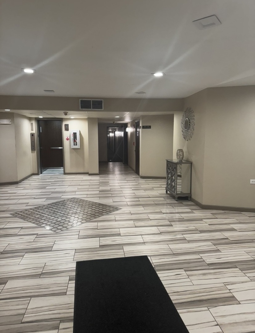 1525 Sander Court, Unit 113 Wheeling, IL 60090 - Photo 15 of 22 a view of a kitchen with a sink