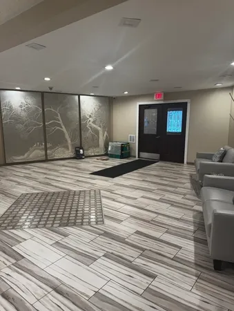a view of a room with furniture