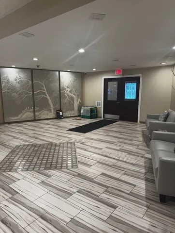 a view of a room with furniture