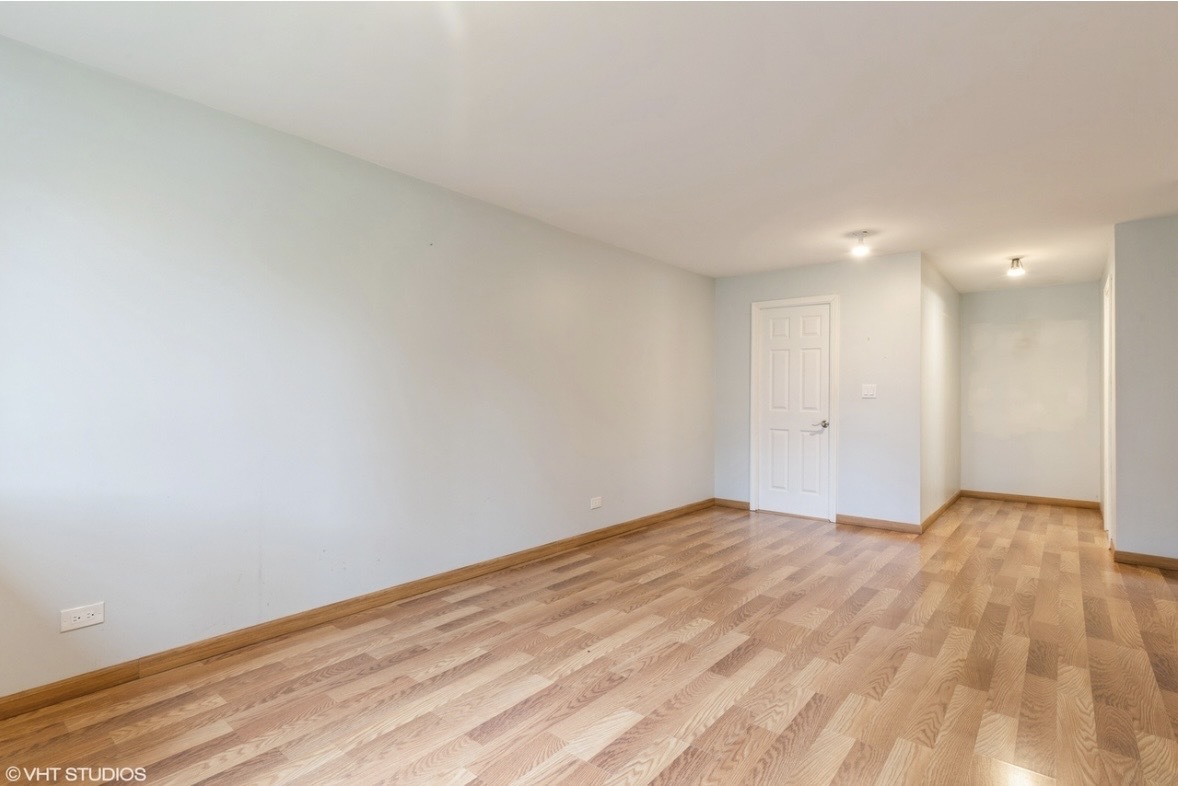 1525 Sander Court, Unit 113 Wheeling, IL 60090 - Photo 10 of 22 a view of an empty room