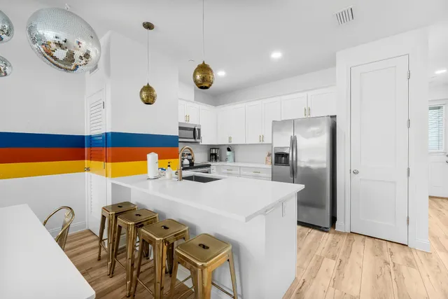 a bedroom with a bed and a table in it