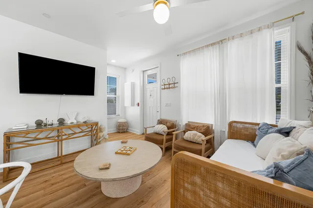 a bathroom with a toilet a sink and a mirror