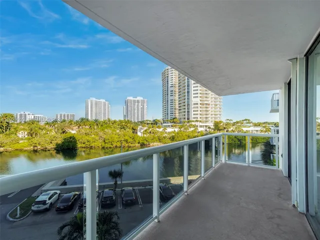 a view of balcony with furniture