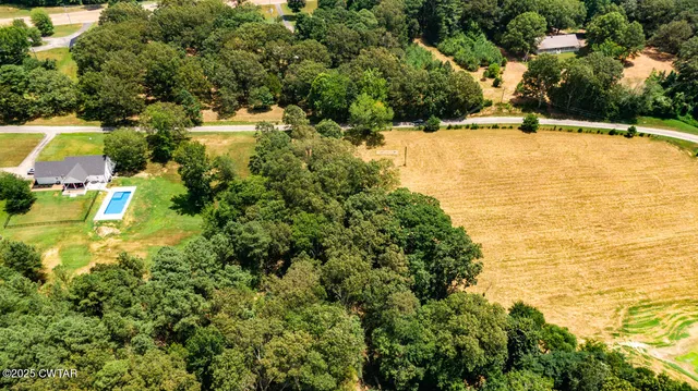 a view of an outdoor space and swimming pool