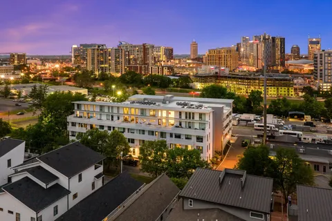 a view of a city with tall buildings