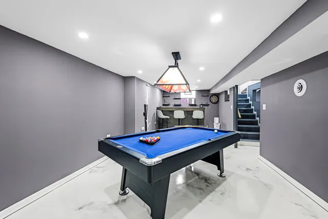 a room with pool table