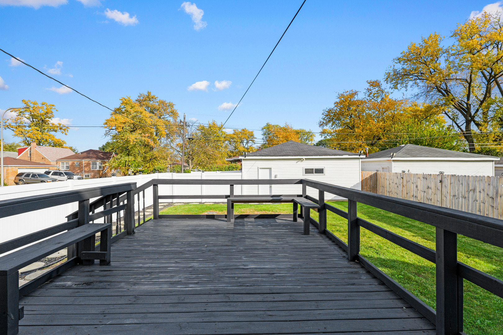 14301 Parnell Avenue Harvey, IL 60426 - Photo 17 of 17 a view of a chairs and table on the wooden deck