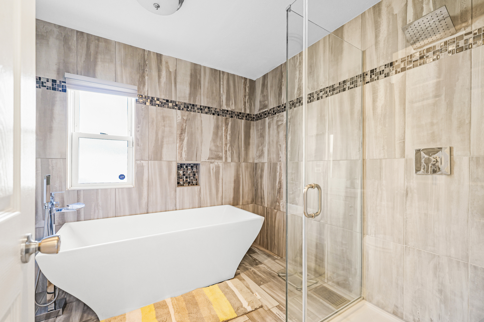 14301 Parnell Avenue Harvey, IL 60426 - Photo 6 of 17 a white bath tub sitting next to a shower