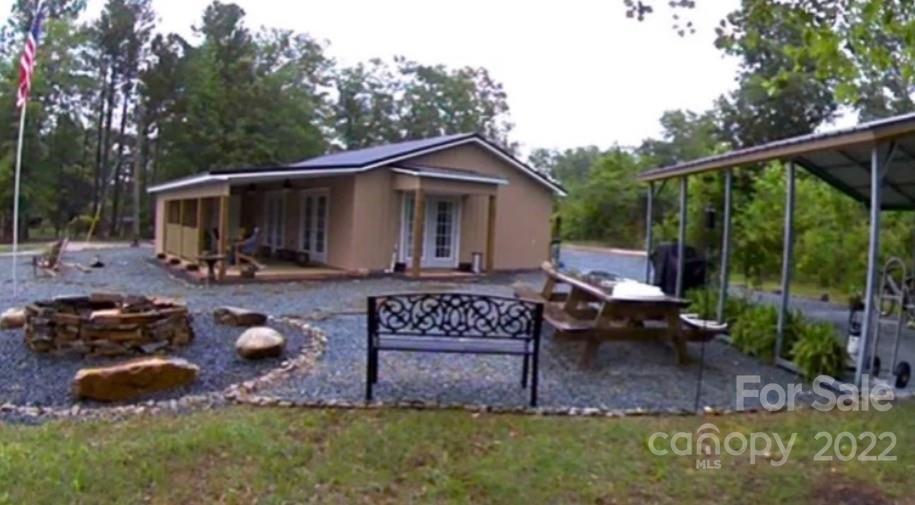 419 Evans Mill Road Chesterfield, SC 29709 - Photo 1 of 1 a view of a couches in backyard of house