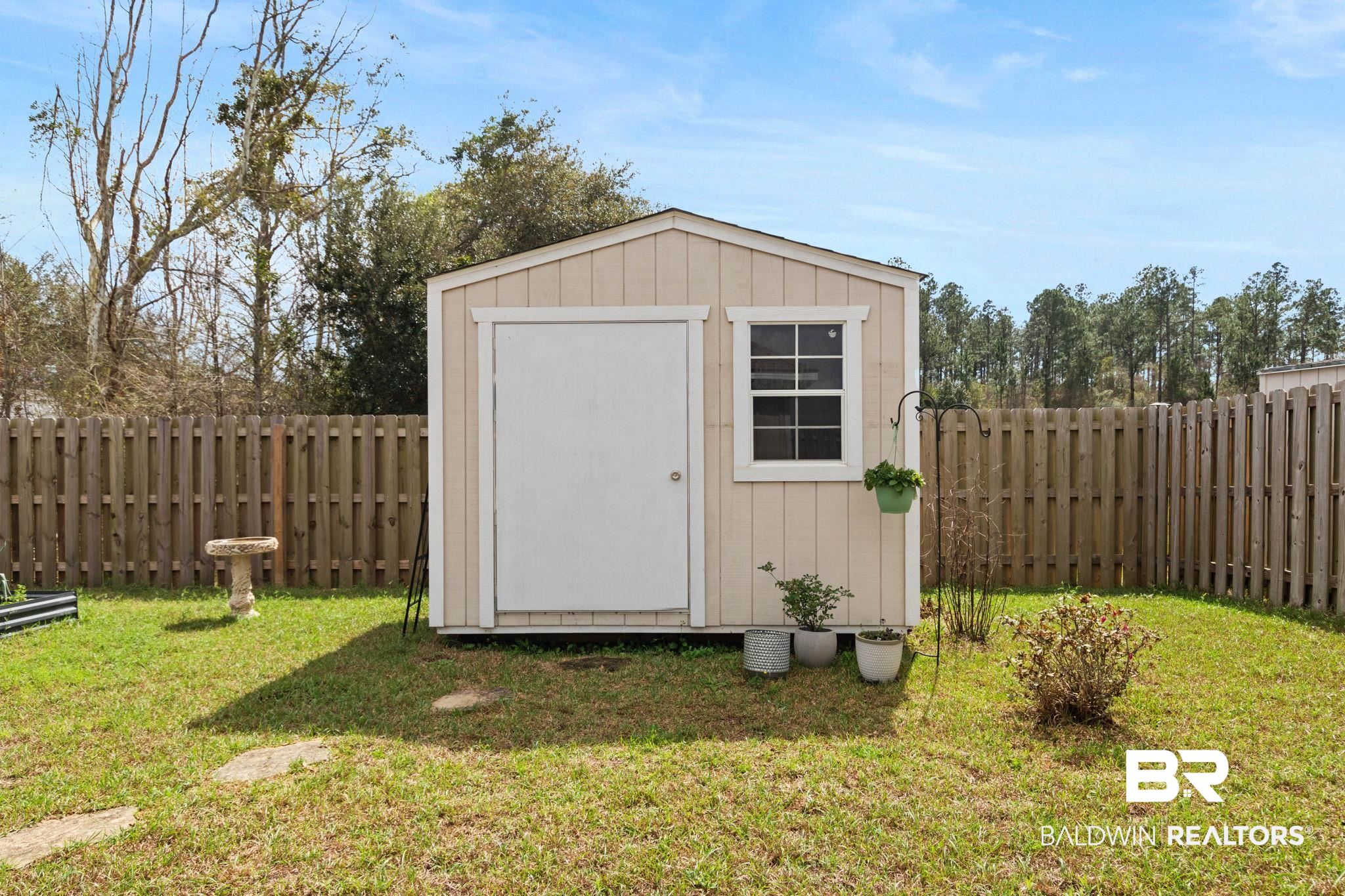 1203 Hayward Loop Foley, AL 36535 - Photo 36 of 41 View of shed featuring a fenced backyard