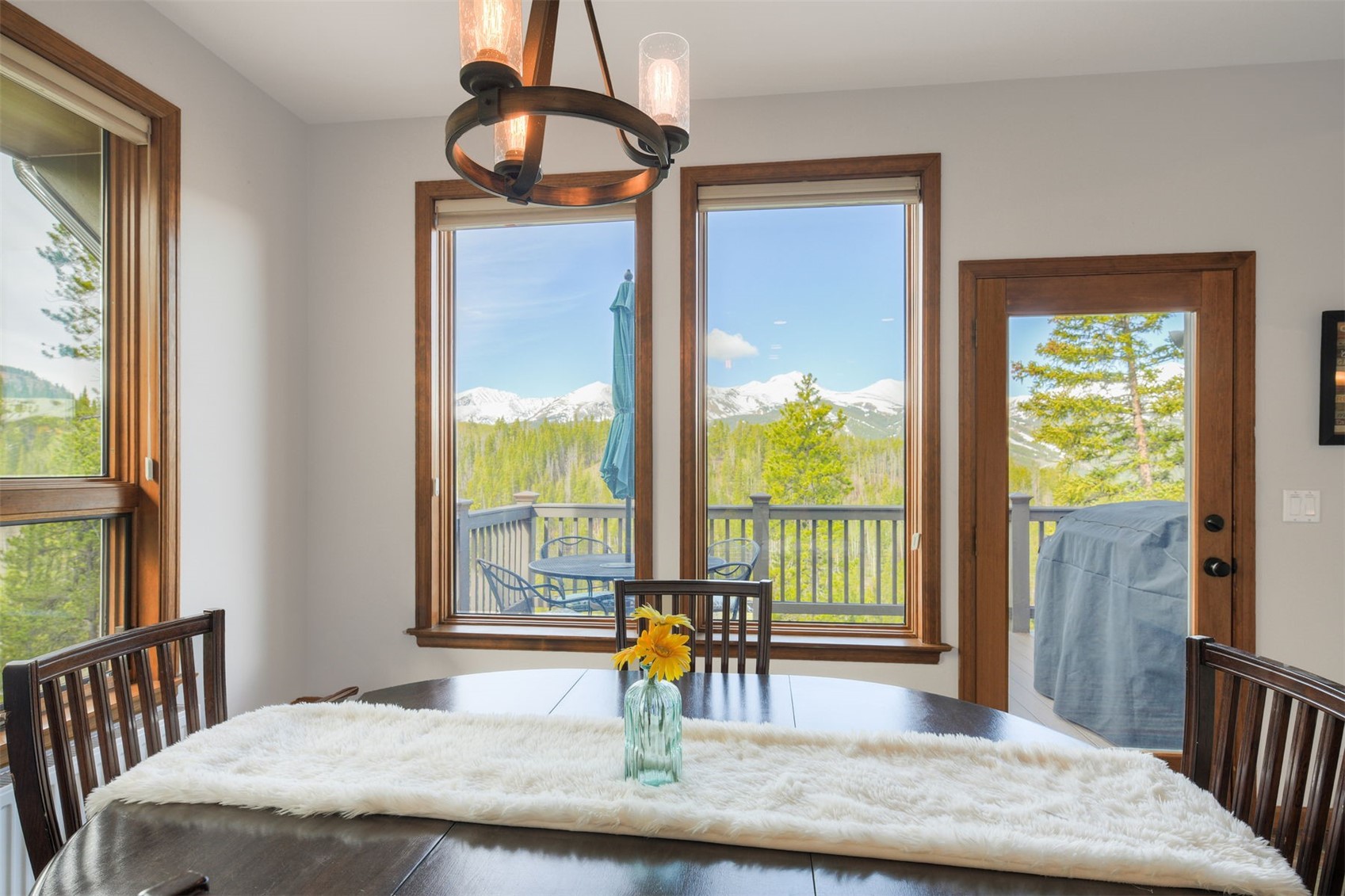 2542 Boreas Pass Road Breckenridge, CO 80424 - Photo 14 of 33 a bedroom with a bed and large windows