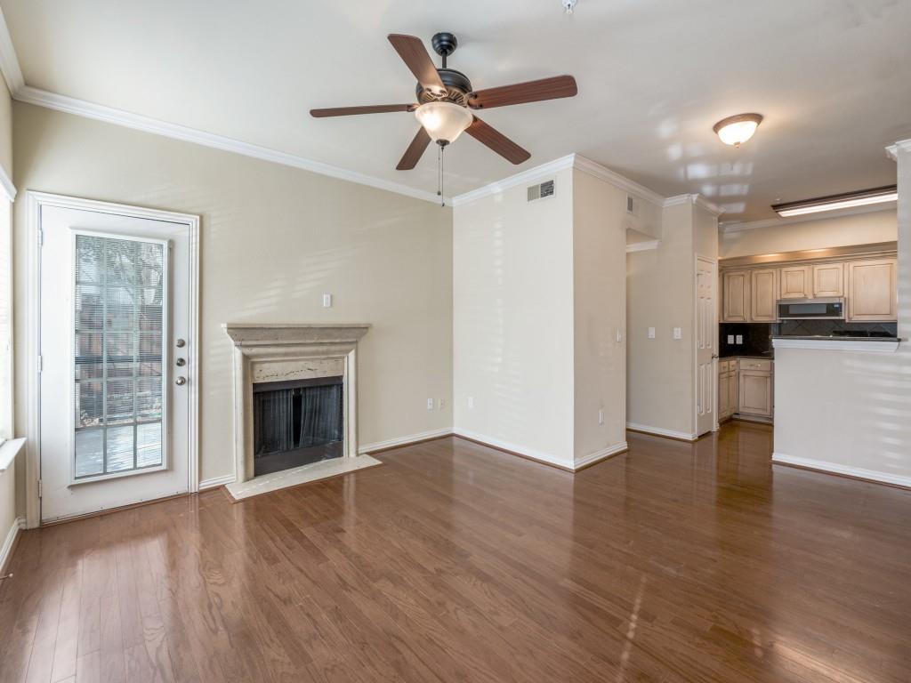 2601 Preston Road, Unit 6109 Plano, TX 75093 - Photo 4 of 16 a view of an empty room with window and wooden floor