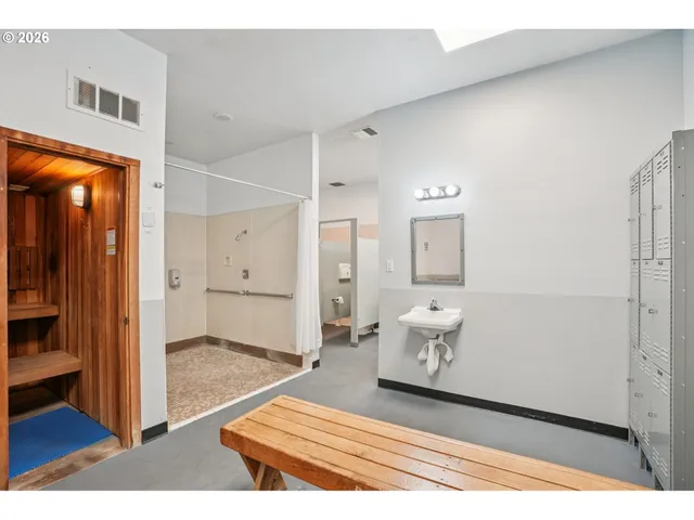 a spacious bathroom with a shower