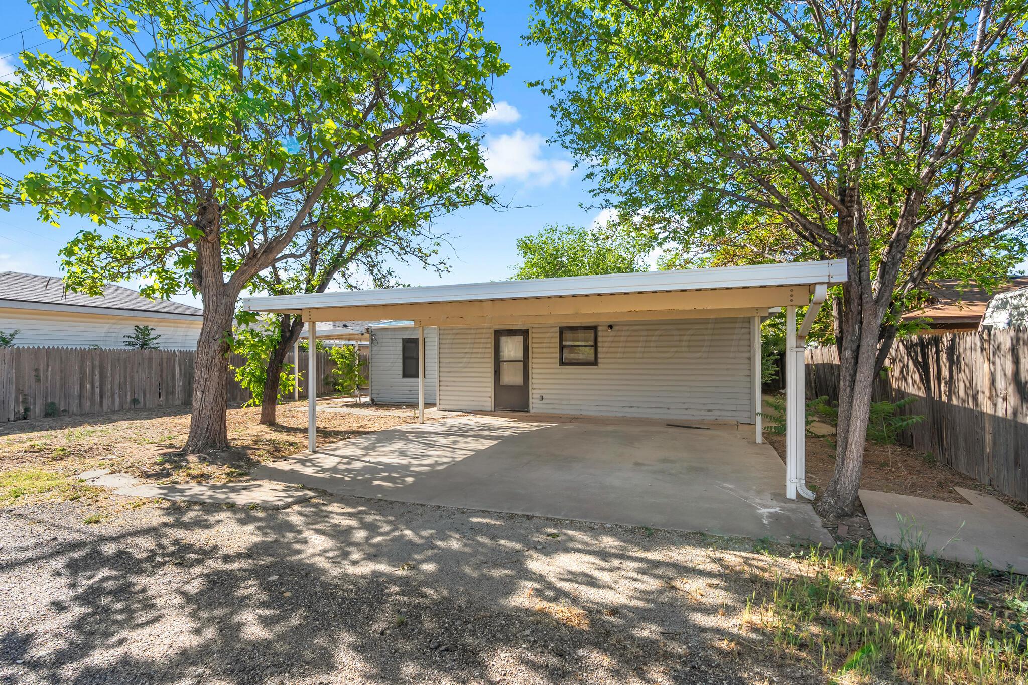 2708 Salem Drive Amarillo, TX 79110 - Photo 20 of 21 a view of a house with a tree in front of it