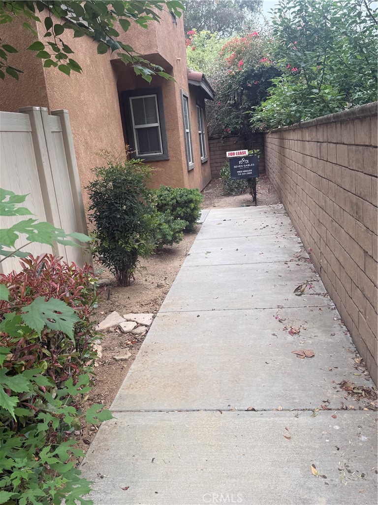 4420 Kristen Court Riverside, CA 92501 - Photo 6 of 39 WALK WAY LEADING TO FRONT DOOR AND LOC BOX