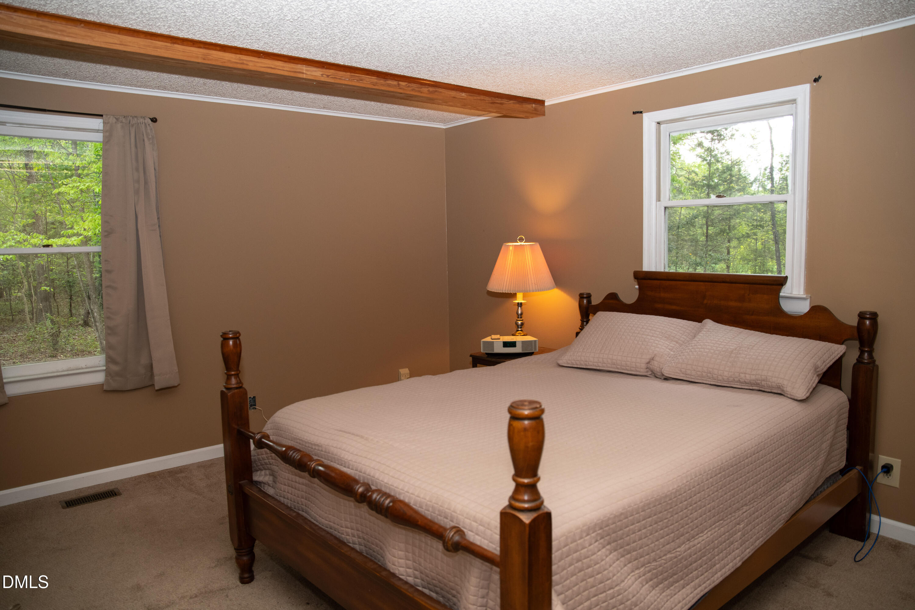 230 Hillsborough Road Timberlake, NC 27583 - Photo 12 of 15 a bedroom with a bed and a window