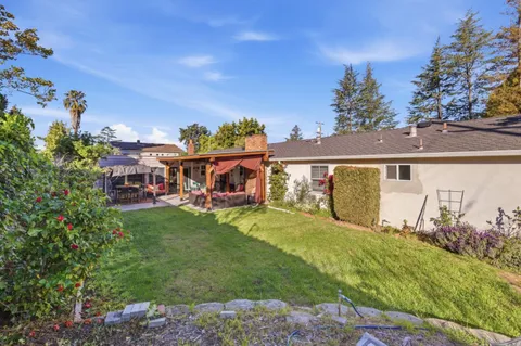 front view of a house with a big yard