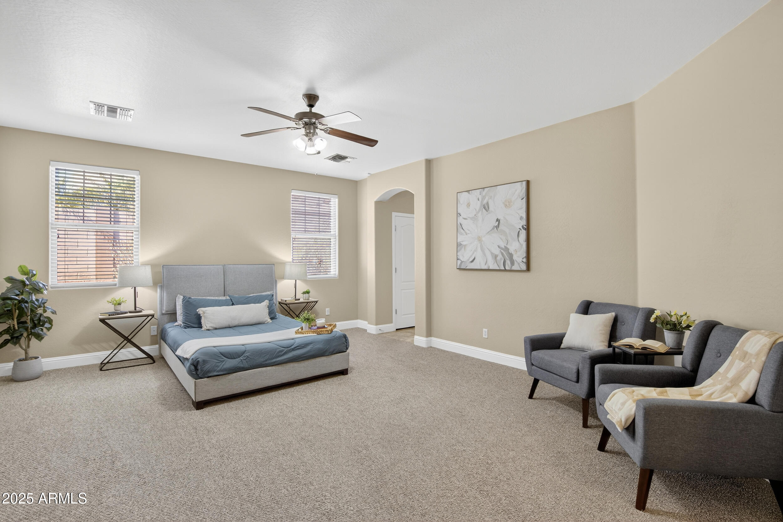 17368 West Red Bird Road Surprise, AZ 85387 - Photo 30 of 82 a living room with furniture and a large window