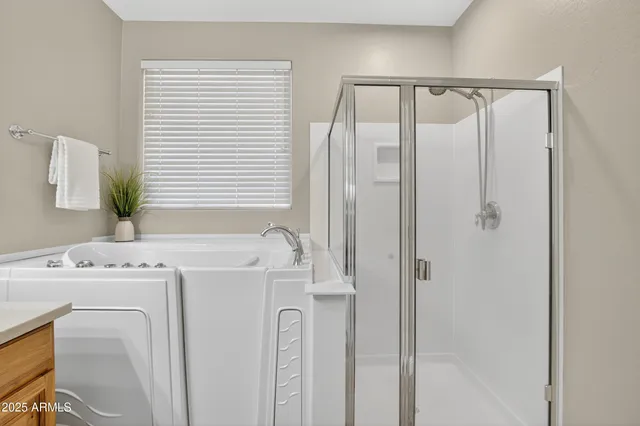 a view of an empty room with a cabinet