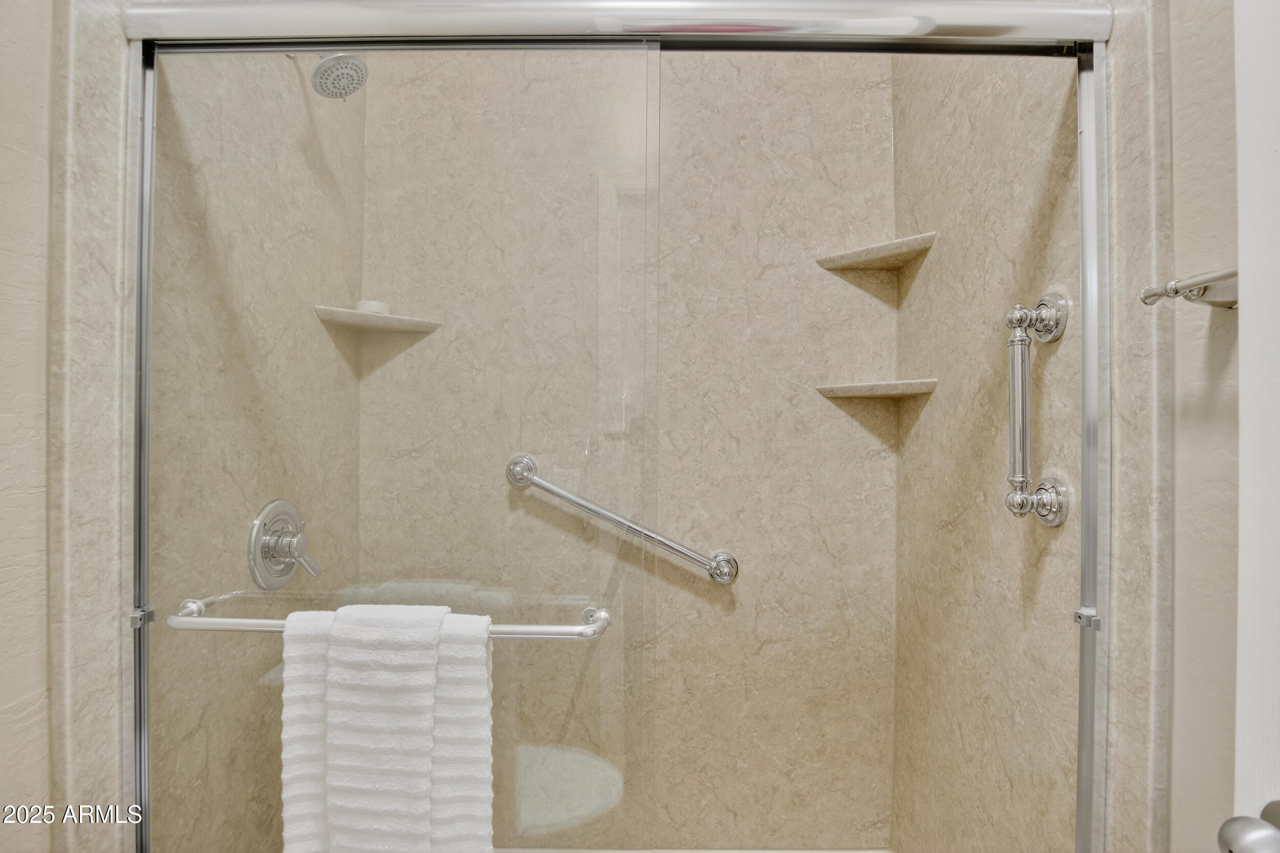 17368 West Red Bird Road Surprise, AZ 85387 - Photo 39 of 82 a bathroom with a shower