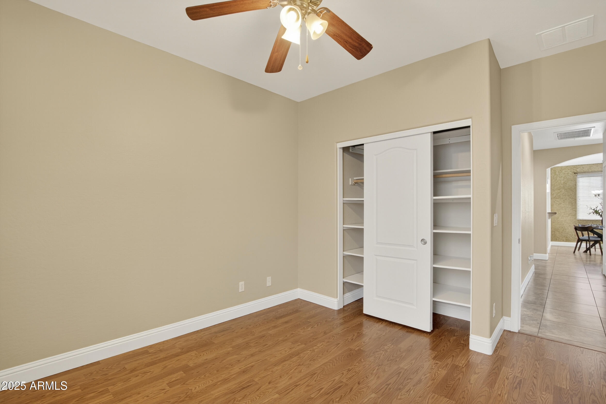 17368 West Red Bird Road Surprise, AZ 85387 - Photo 42 of 82 a view of an empty room with a window