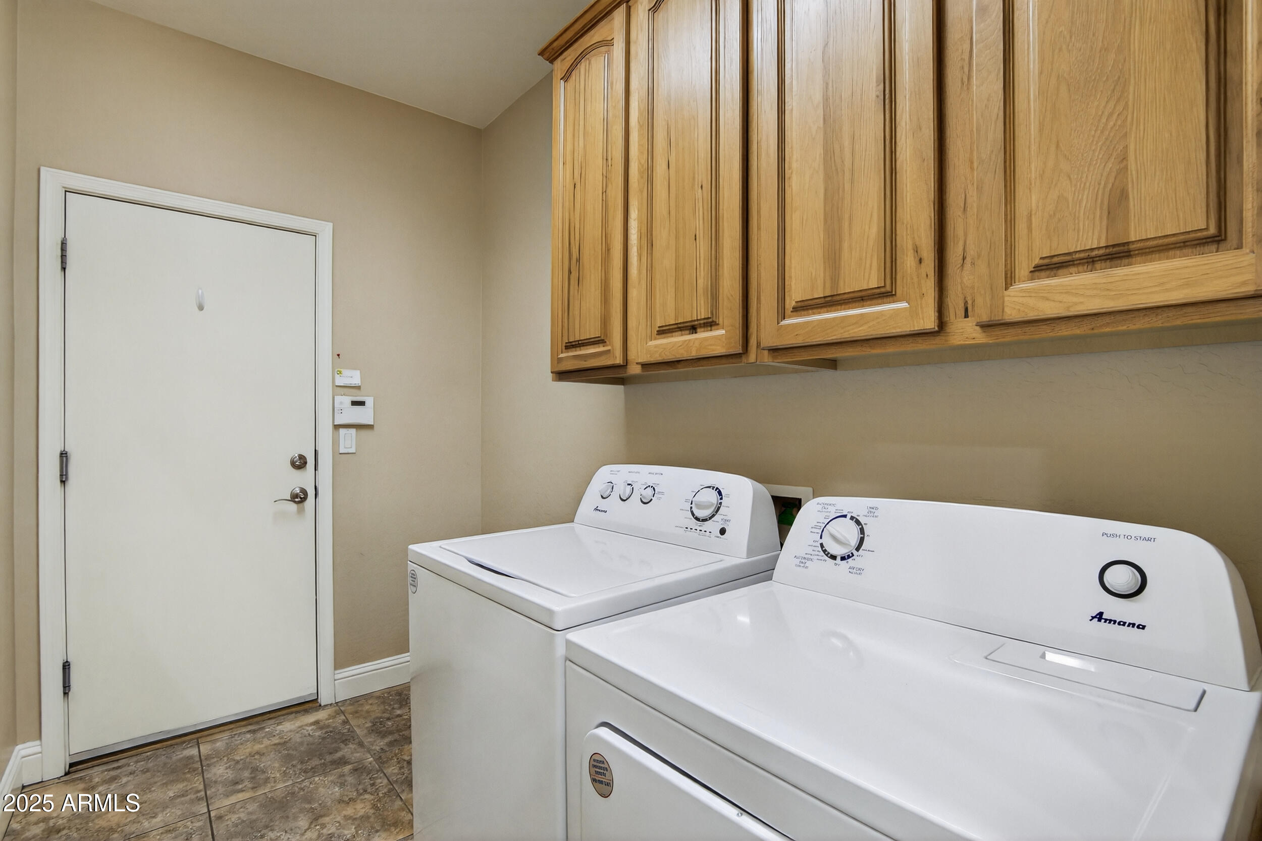 17368 West Red Bird Road Surprise, AZ 85387 - Photo 48 of 82 a utility room with dryer and washer