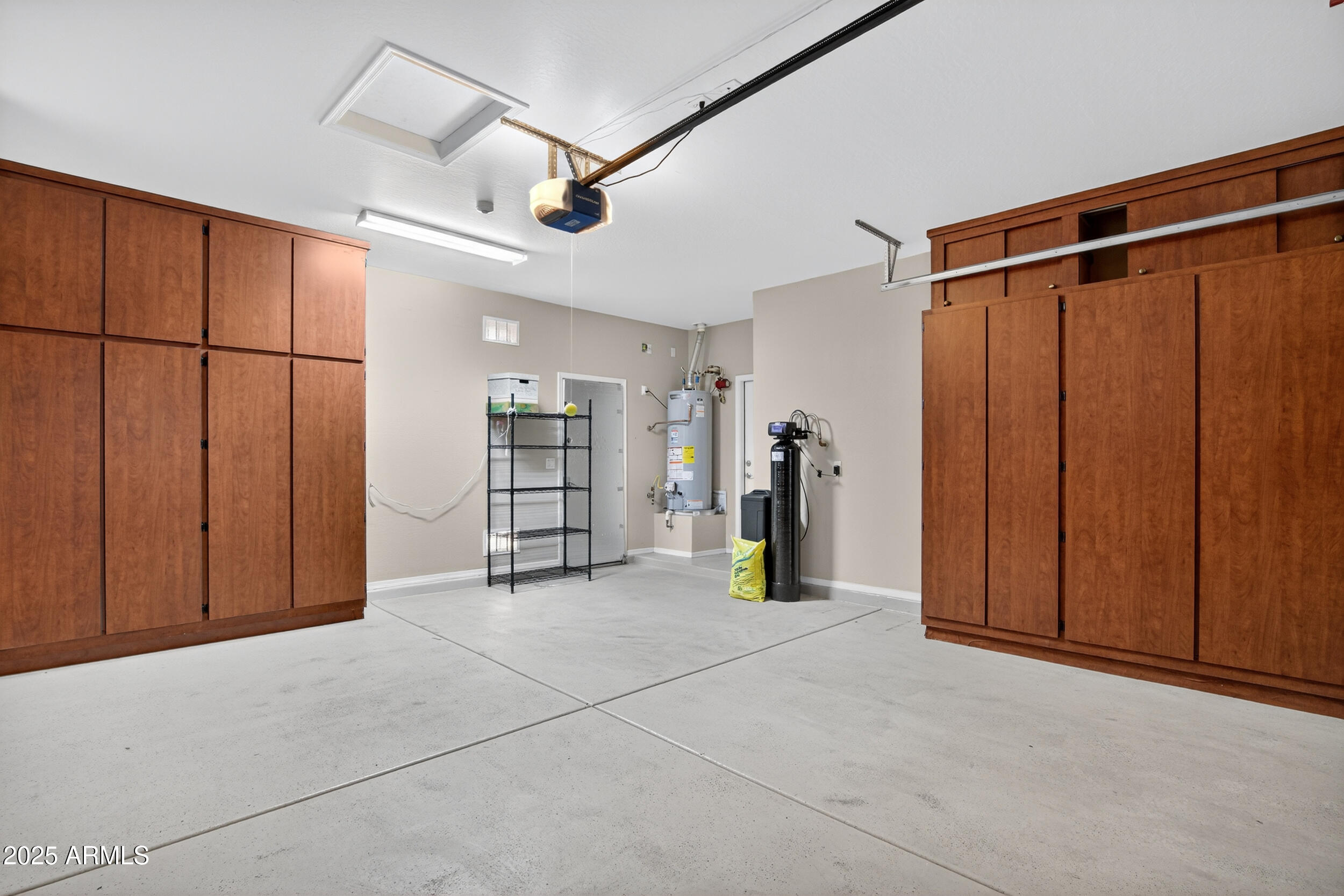 17368 West Red Bird Road Surprise, AZ 85387 - Photo 51 of 82 a view of an empty room with a cabinet